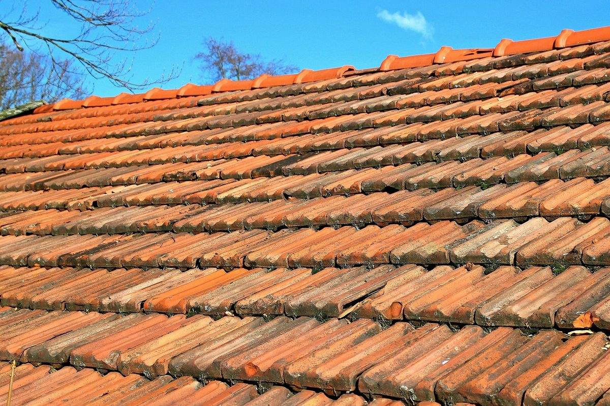 Before: Original roofing condition